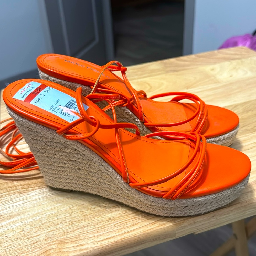 Bright orange strap up wedges